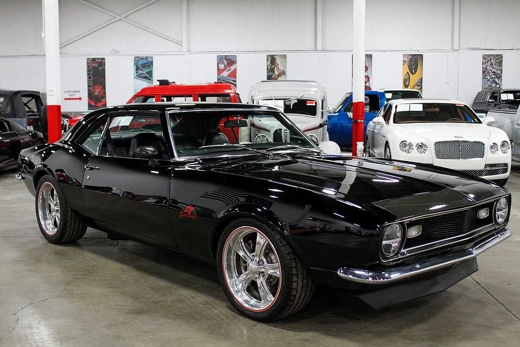 Black 1968 Chevrolet Camaro SS photographed in the showroom